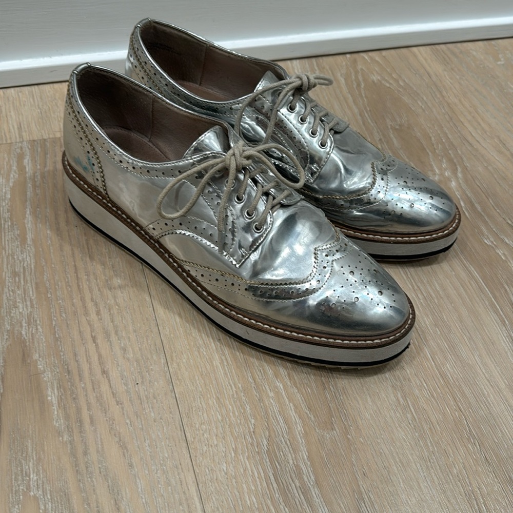 Shelly’s London silver platform Oxford shoes